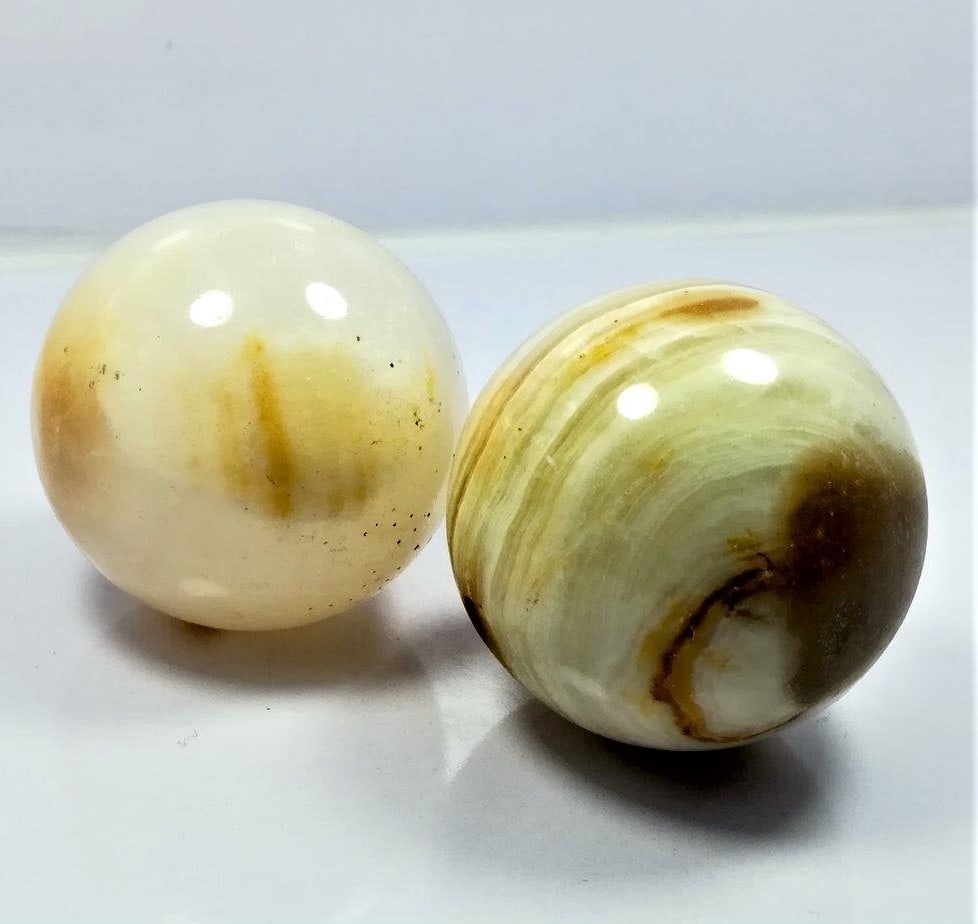 Paired Onyx Sphere - 329.3 Grams: Paired Onyx Sphere - 329.3 GramsShipping Rate: $45.00 .shipping rates are determined by Parcel weight and destination.Combined shipping: We offer combine shipping on multiple items purchased to