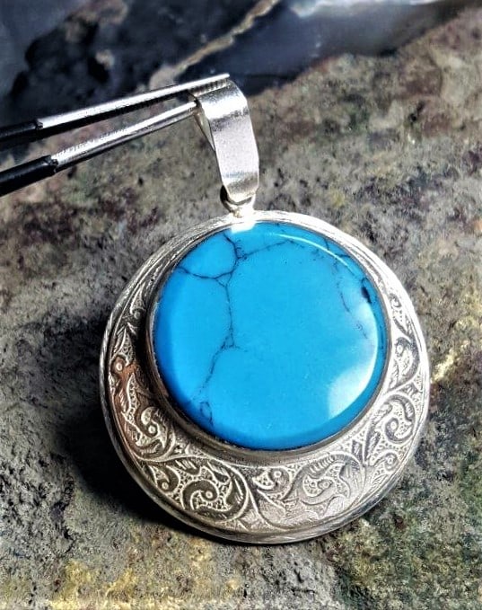 Sterling Silver Torquoise Pendant: Sterling Silver Torquoise PendantShipping Rate: $23.00 .shipping rates are determined by Parcel weight and destination.Combined shipping: We offer combine shipping on multiple items purchased to reduc