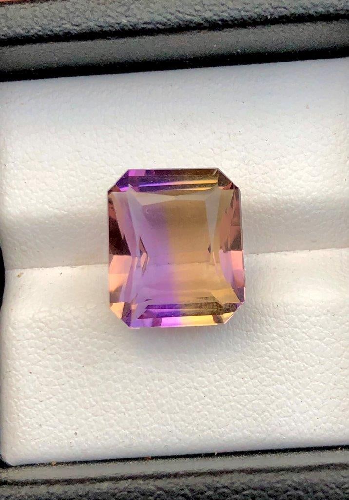 8.25 Carats Bi Colour Ametrine - 13X11X8 mm: 8.25 Carats Bi Colour Ametrine - 13X11X8 mmShipping Rate: $15.00 .shipping rates are determined by Parcel weight and destination.Combined shipping: We offer combine shipping on multiple items purchase