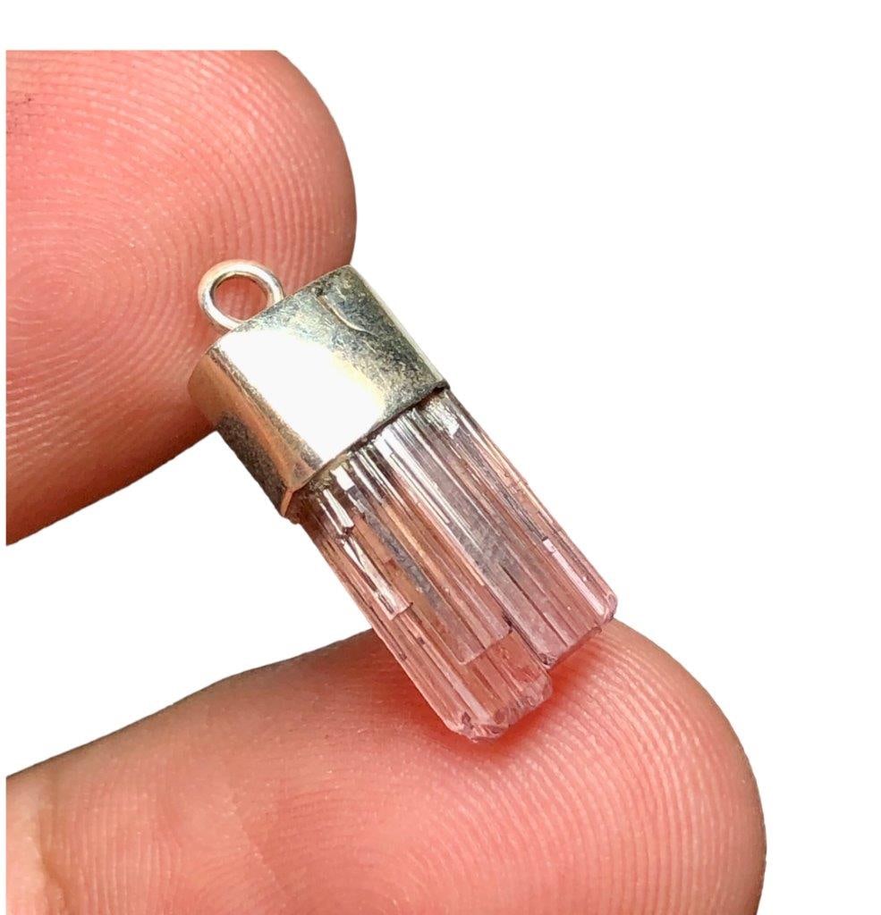 Pink Tourmaline Pendant in Silver: Pink Tourmaline Pendant in SilverShipping Rate: $23.00 .shipping rates are determined by Parcel weight and destination.Combined shipping: We offer combine shipping on multiple items purchased to reduc