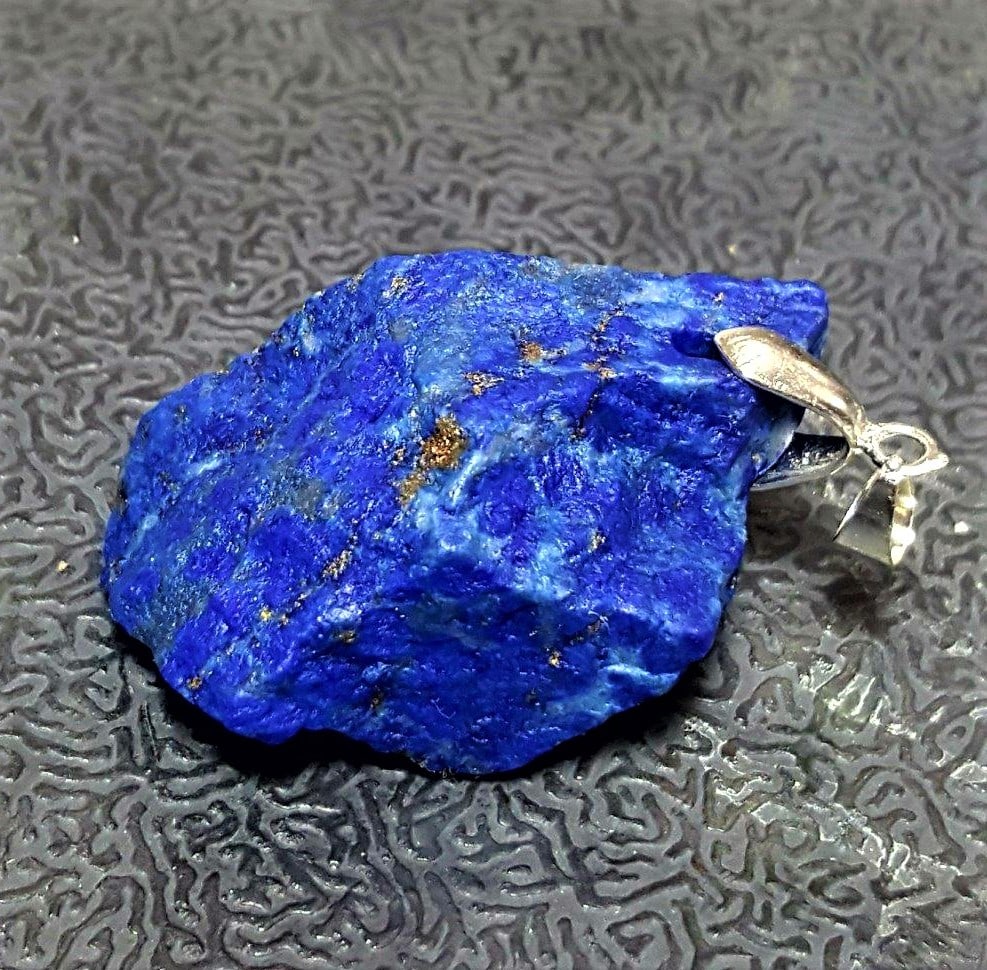 Lapis Lazuli pendant: Lapis Lazuli Gemstone pendant Shipping: $23.00. Shipping rates are determined by Parcel weight and destination.