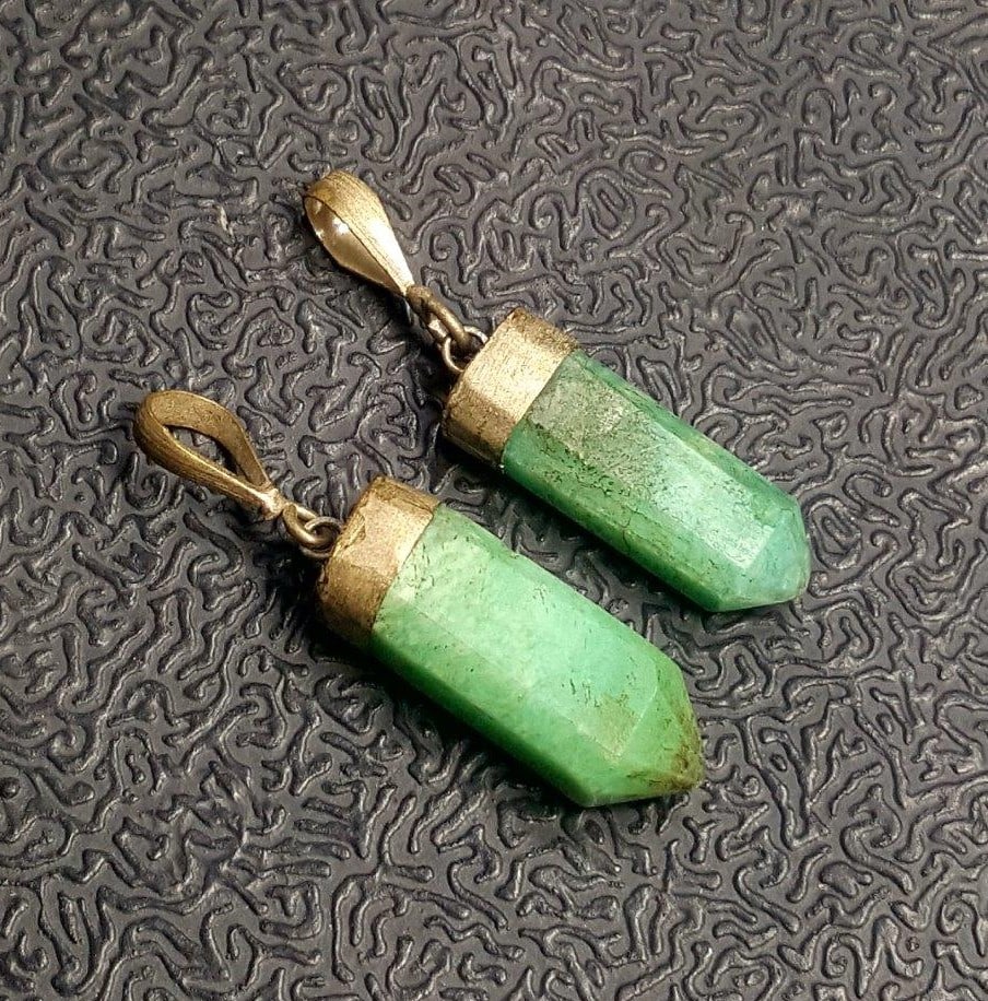 Serpentine Paired Pendants in Silver: Fashion Jewelry - Serpentine Paired Pendants in Silver Shipping: $23.00. Shipping rates are determined by Parcel weight and destination.