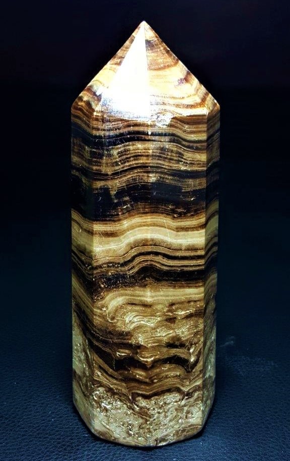 High Quality Chocolate Calcite Tower - 500 Grams: High Quality Large Chocolate Calcite Tower - 500 GramsShipping Rate: $50.00 .shipping rates are determined by Parcel weight and destination.Combined shipping: We offer combine shipping on multiple
