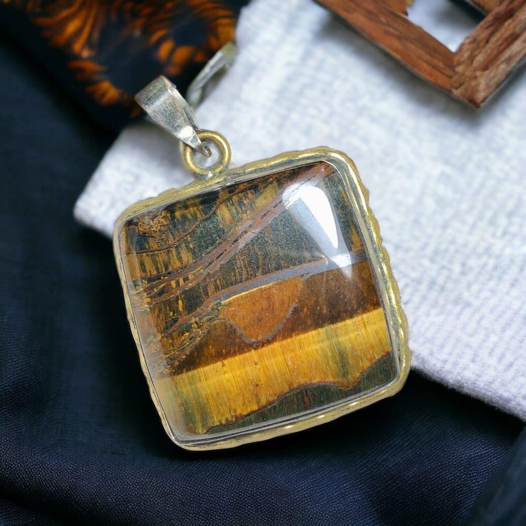 Tiger?s Eye Handmade Pendant Handmade Jewelry: 4.35 Carats Natural Aquamarine Cab - 11X9X6 mm Shipping: