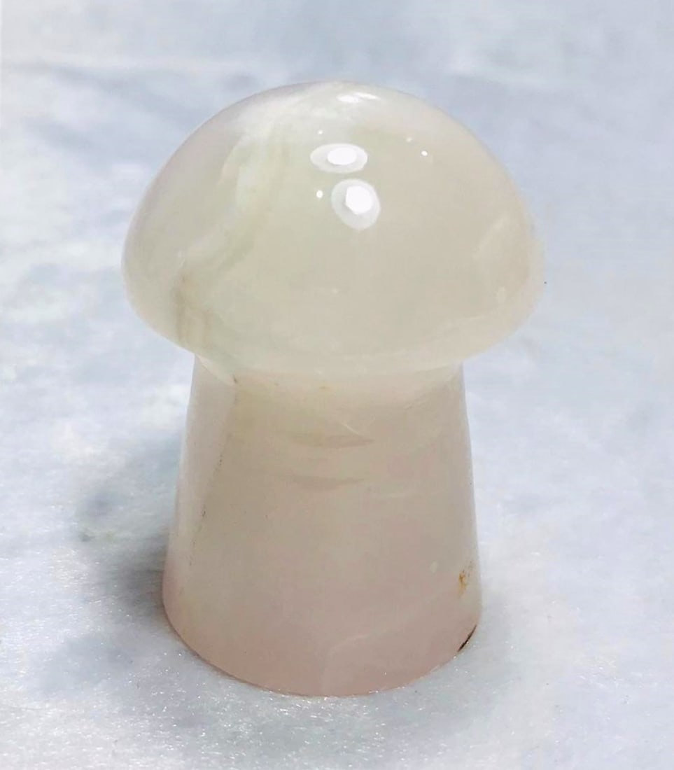 Calcite pinkish color Mashroom - 98.3G: Calcite pinkish color Mashroom - 98.3G - 52.5X38mm Shipping: $23.00. Shipping rates are determined by Parcel weight and destination.
