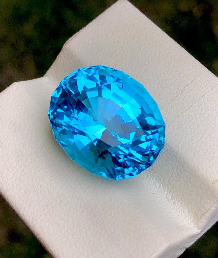 33.45 Carats AAA Swiss Blue Topaz ? Natural Loose Gemstone (20?17?14 mm) ? Brilliant Blue Collector: 33.45 Carats AAA Swiss Blue Topaz Natural Loose Gemstone (20?17?14 mm) ? Brilliant Blue Collector StoneDescriptionThis exceptional 33.45 carat Swiss Blue Topaz features a vivid, radiant blue color wit