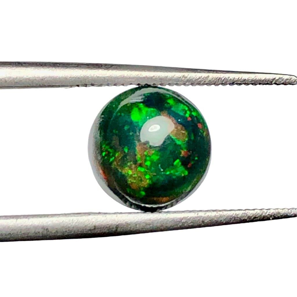 1.90 Carats Black Opal - 9X5 mm: 1.90 Carats Black Opal - 9X5 mmShipping Rate: $15.00 .shipping rates are determined by Parcel weight and destination.Combined shipping: We offer combine shipping on multiple items purchased to reduce 