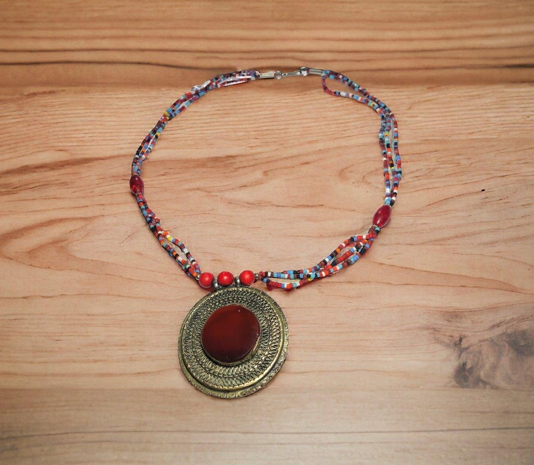 Afghan Bib Agate Necklace Kuchi Tribal Jewelry: Afghan Bib Agate Necklace Kuchi Tribal JewelryShipping Rate: $23.00 .shipping rates are determined by Parcel weight and destination.Combined shipping: We offer combine shipping on multiple items