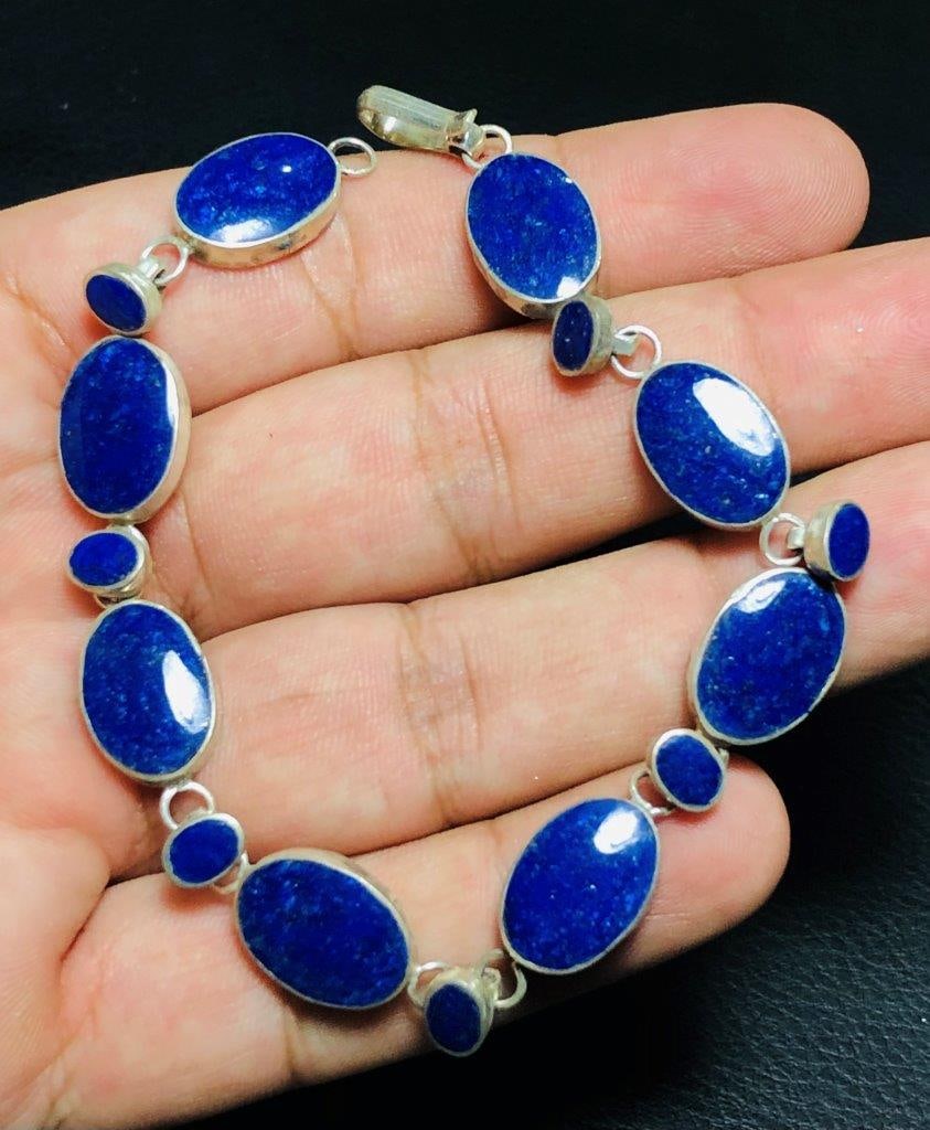 Sterling Silver Lapis Lazuli Bracelet: Sterling Silver Lapis Lazuli BraceletShipping Rate: $23.00 .shipping rates are determined by Parcel weight and destination.Combined shipping: We offer combine shipping on multiple items purchased to r