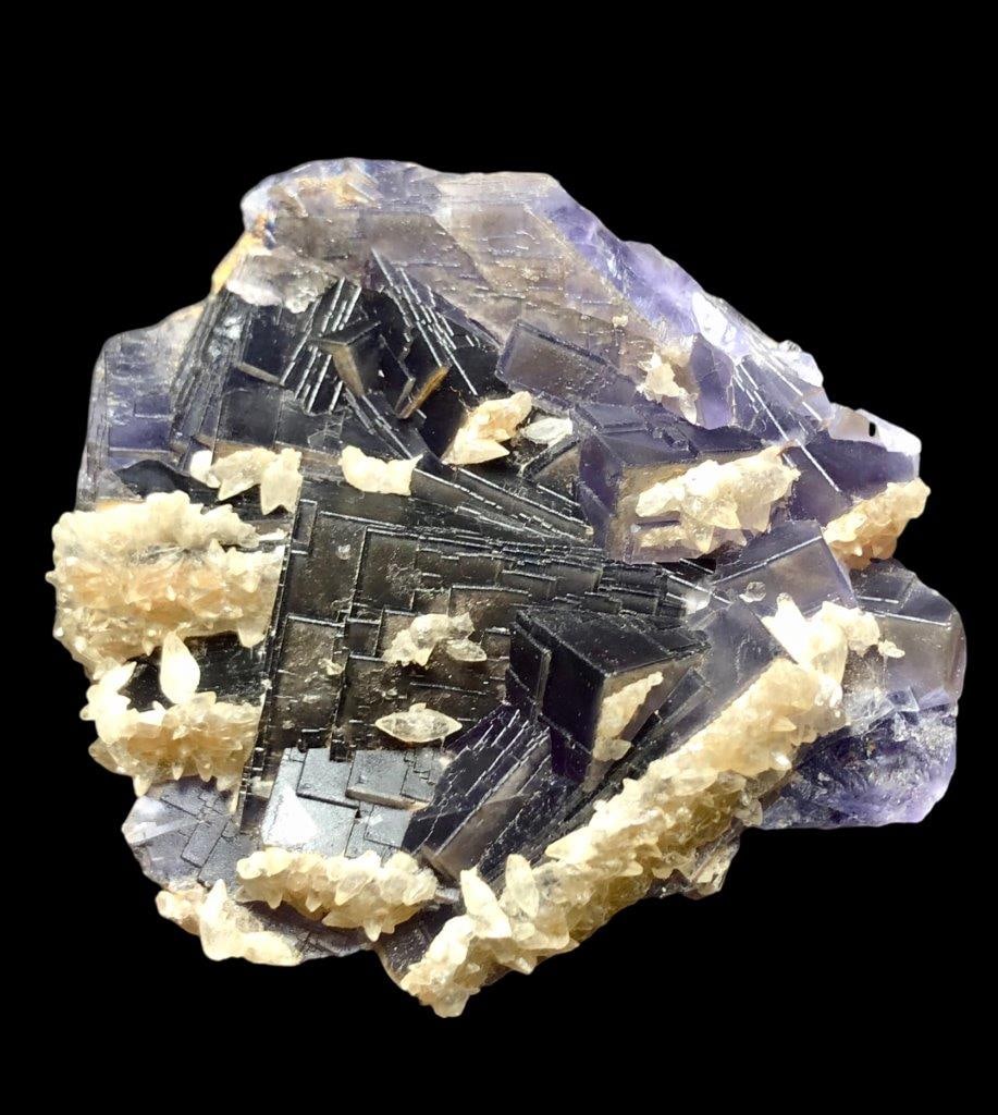 95 Grams Deep Purple Fluorite With Calcite Mineral: 95 Grams Deep Purple Fluorite With Calcite MineralShipping Rate: FREE SHIPPINGshipping rates are determined by Parcel weight and destination.Combined shipping: We offer combine shipping on multiple it