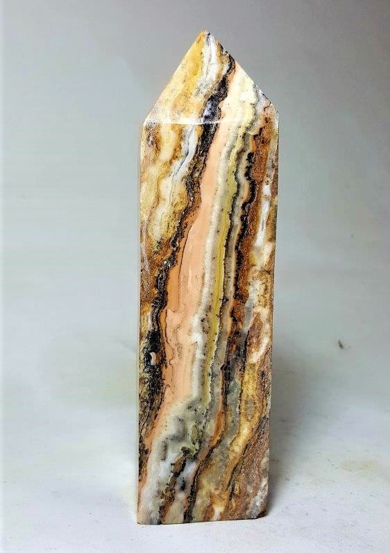 511 Grams Mix Calcite Tower: 511 Grams Mix Calcite Tower Shipping: $50.00. Shipping rates are determined by Parcel weight and destination.