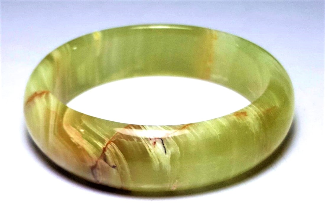 Greenish Onyx Healing Bangle: Greenish Onyx Healing Bangle Shipping: $23.00. Shipping rates are determined by Parcel weight and destination.