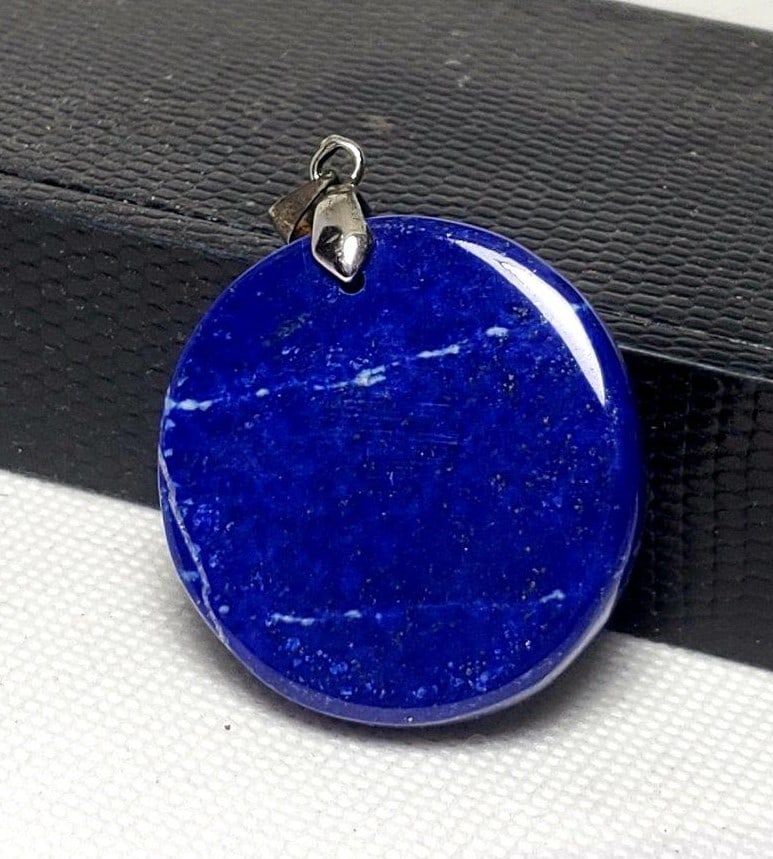 Sterling Silver Lapis Lazuli Pendant: Sterling Silver Lapis Lazuli Pendant - Amazing Jewelry- 25X24X10mm Shipping: $23.00. Shipping rates are determined by Parcel weight and destination.