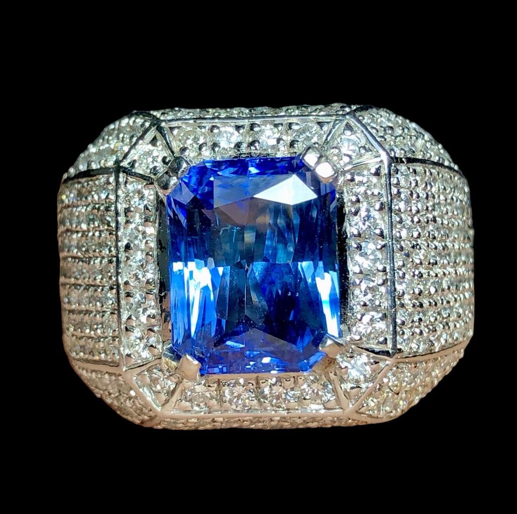 Top Grade Natural Sapphire With Diamonds in Platinum RING: Top Grade Natural Sapphire With Diamonds in Platinum RING Celyon Sapphire Weight: 9.85 Carats, Diamonds: 2.80 Carats VVS2, 21 Crts Platinum Weight: 24 Grams Sterling Silver Natural Spessartite Garnet 
