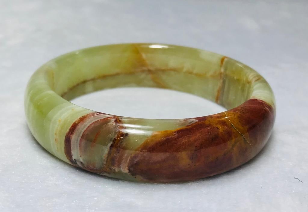 Onyx green mix shade bangle - 70.2G: Onyx green mix shade bangle - 78mm - 70.2G Shipping: $23.00. Shipping rates are determined by Parcel weight and destination.
