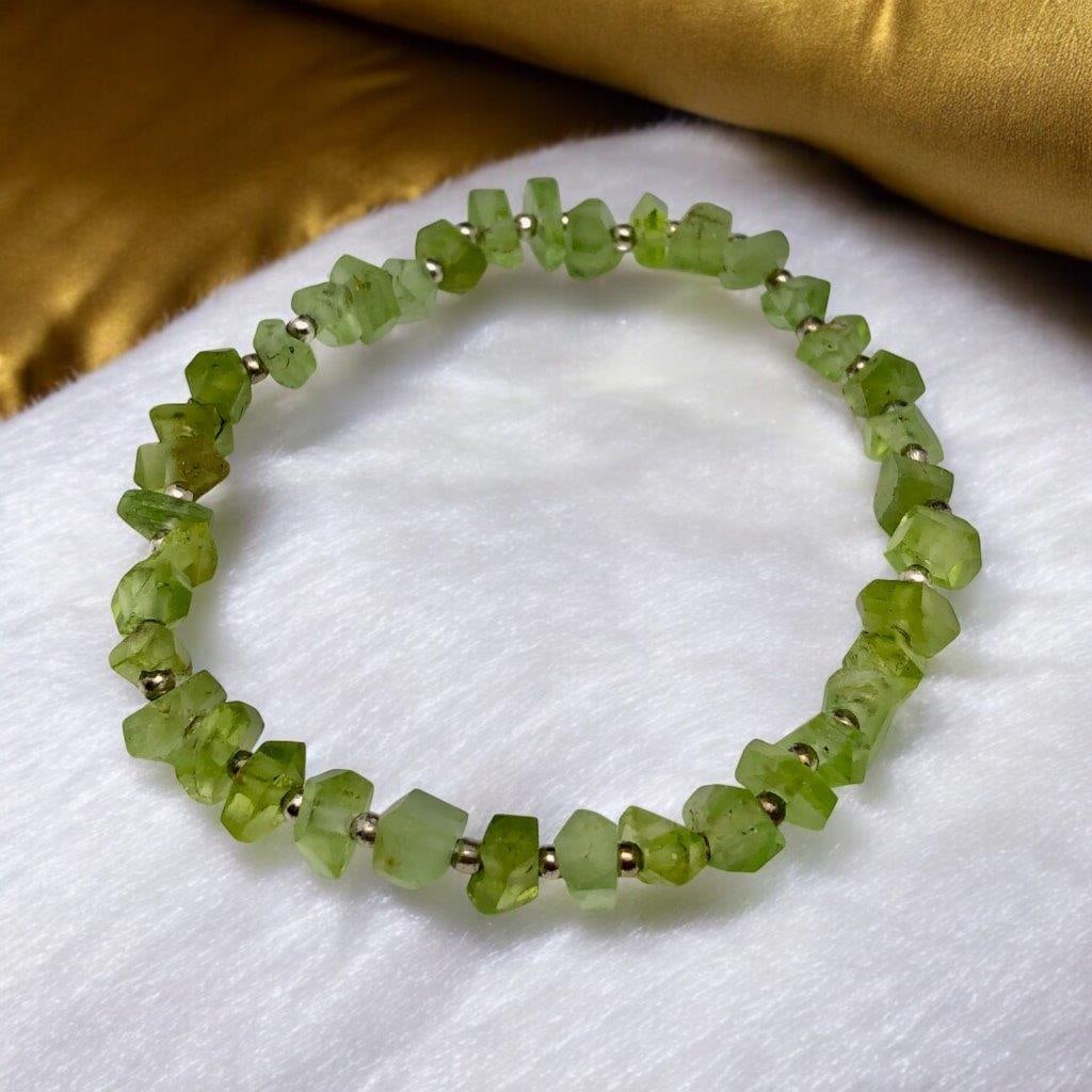 Raw Peridot Bracelet ? Natural Stretchable Gemstone, Handmade Healing Crystal Jewelry: Add a fresh and vibrant touch to your collection with this Raw Peridot Stretchable Bracelet, crafted from natural, unpolished gemstone chips that highlight the organic beauty of peridot. Featuring bri
