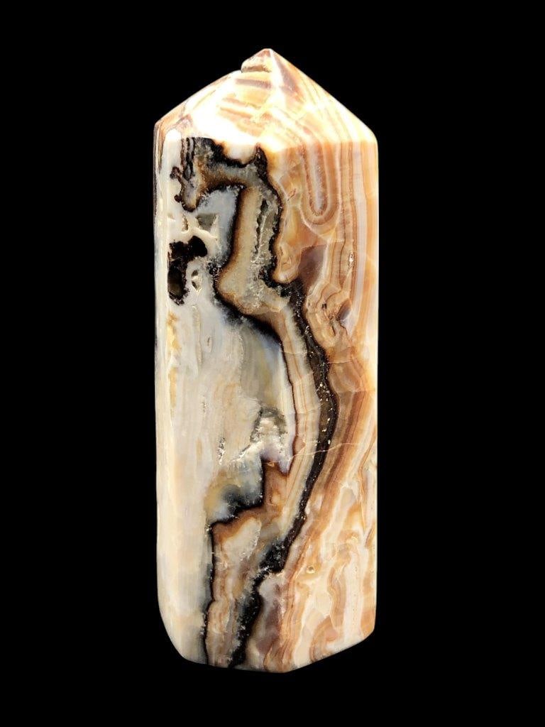 Natural Mixed Calcite Crystal Tower 550g ? Polished Stone Obelisk: Bring natural elegance into your space with this Natural Mixed Calcite Crystal Tower, weighing approximately 550 grams. Carefully cut and polished from genuine mixed calcite stone, this obelisk showca
