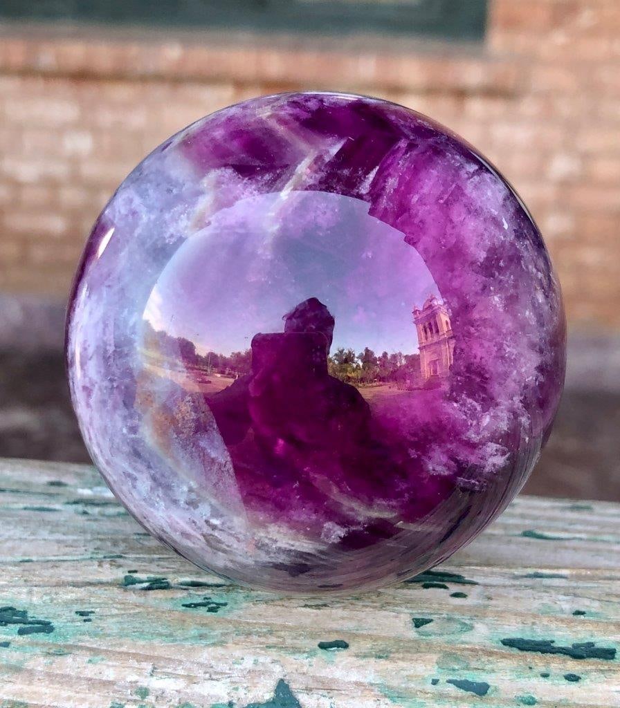 350g Rainbow Fluorite Sphere ? Banded Feather Crystal Ball, Natural Polished Healing Stone: Discover the captivating beauty of this Rainbow Fluorite Banded Feather Crystal Sphere, a stunning natural specimen featuring intricate feather-like inclusions and vibrant color banding. With its blen