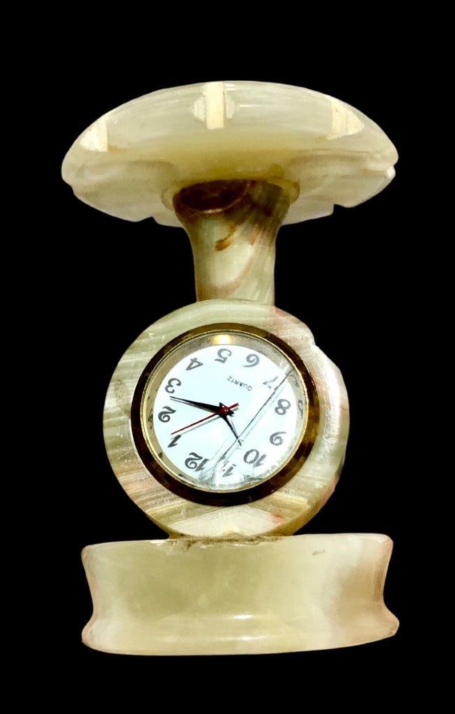 Vintage Onyx Marble Office Table Clock: Vintage Onyx Marble Office Table Clock Shipping: $58.00. Shipping rates are determined by Parcel weight and destination.