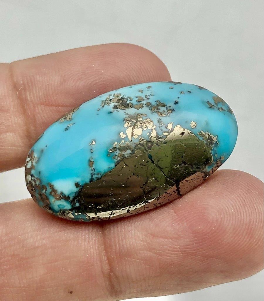 51.35 Carats Natural Turquoise Gemstone With Pyrite - 32X19X10 mm: 51.35 Carats Natural Turquoise Gemstone With Pyrite - 32X19X10 mm Choose design of your own and we will make it for youWe accept custom order in Sterling Silver, Gold and Platinum in WholeSale PriceCo