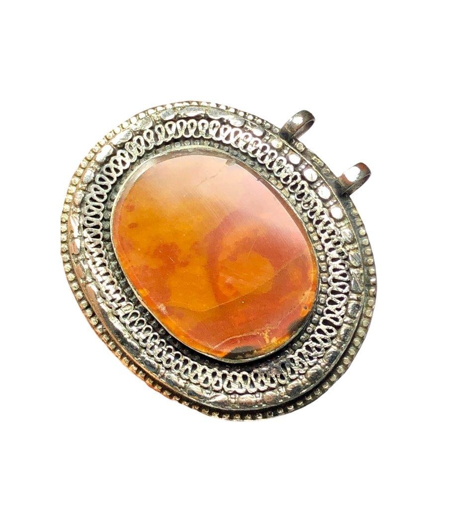 Natural Polished Agate Pendant: Natural Polished Agate Pendant Shipping: $23.00. Shipping rates are determined by Parcel weight and destination.