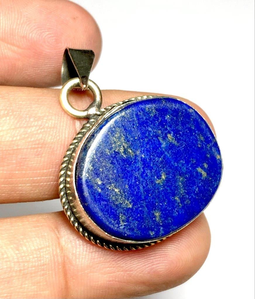 Lapis Pendant power, Love, Purification, September Birthstone gift: Lapis Pendant power, Love, Purification, September Birthstone gift Shipping: $23.00. Shipping rates are determined by Parcel weight and destination.