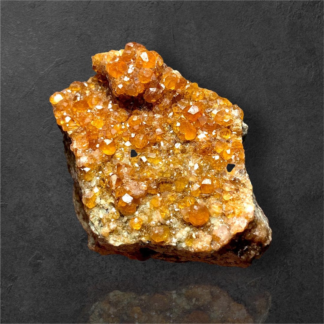 Natural Hessonite Garnet Cluster on Matrix - 77.9 Grams - 52X38X32 mm: Natural Hessonite Garnet Cluster on Matrix - 77.9 Grams - 52X38X32 mmShipping Rate: $25.00 .shipping rates are determined by Parcel weight and destination.Combined shipping: We offer combine shipping 