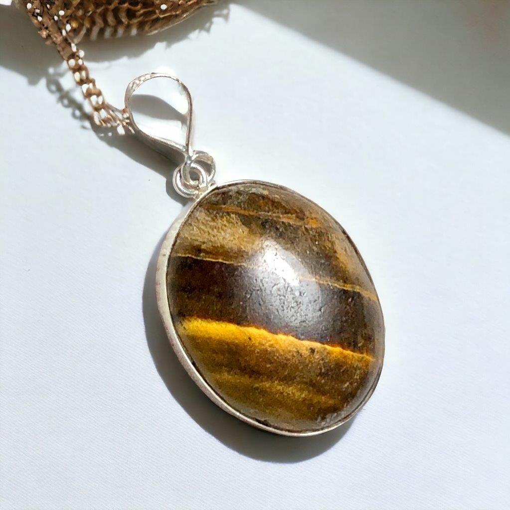 Tiger's eye Oval Shape crystal Pendant: 4.35 Carats Natural Aquamarine Cab - 11X9X6 mm Shipping: