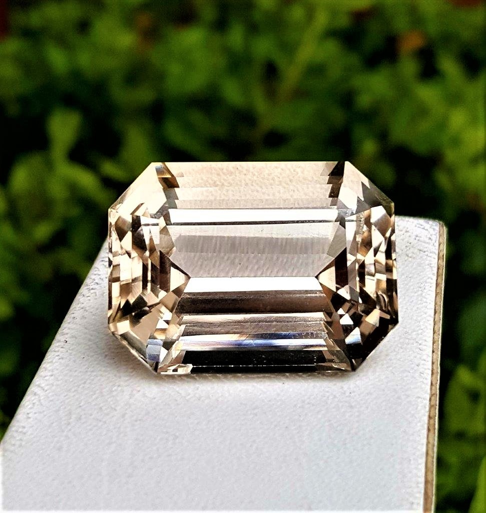 Golden Topaz Loose Gemstone - 73.25 Carats: Golden Topaz Loose Gemstone Emerald Shape - 73.25 Carats - 26.4X19.4X15 mmShipping Rate: $15.00 .shipping rates are determined by Parcel weight and destination.Combined shipping: We offer combine ship