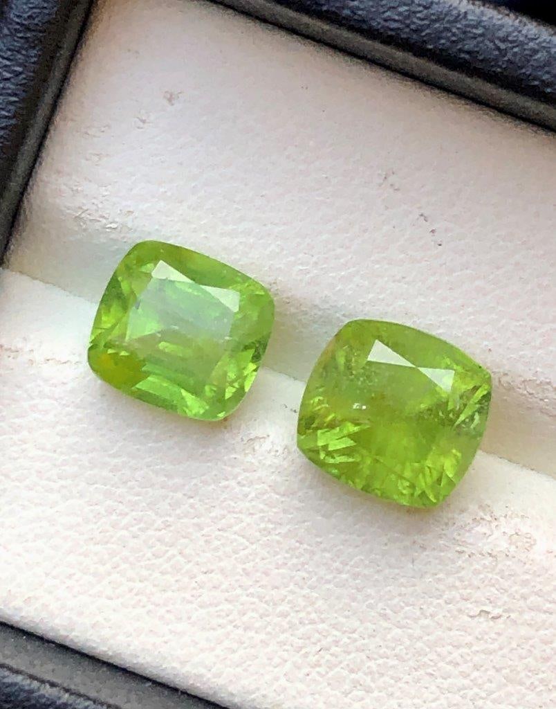 7.20 Carats Paired Peridot Gemstones ? 9?8?6 mm Natural Pair: This listing features a matched pair of natural peridot gemstones with a combined weight of 7.20 carats. Each stone measures approximately 9 ? 8 ? 6 mm, making this pair ideal for coordinated jewelry 