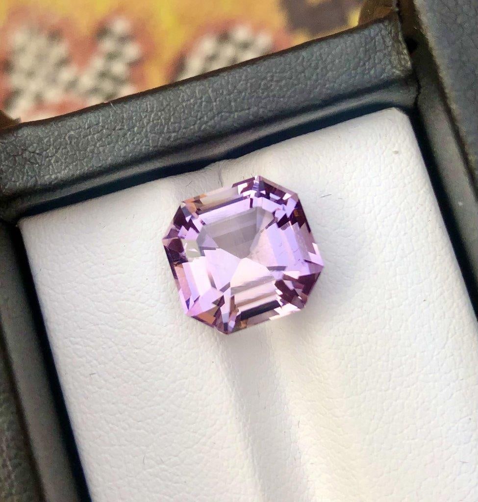 Asscher Cut Natural Ametrine - 7 Carats - 11X11X8 mm: Asscher Cut Natural Ametrine - 7 Carats - 11X11X8 mmShipping Rate: $15.00 .shipping rates are determined by Parcel weight and destination.Combined shipping: We offer combine shipping on multiple items