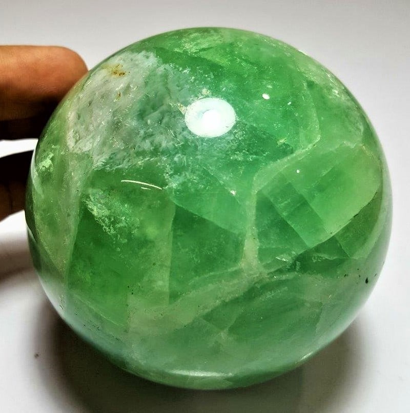 Green fluorite sphere - 887 Grams: Green fluorite sphere - 887 Grams Shipping Rate: 50$shipping rates are determined by Parcel weight and destination.Combined shipping: We offer combine shipping on multiple items purchased to reduce sh