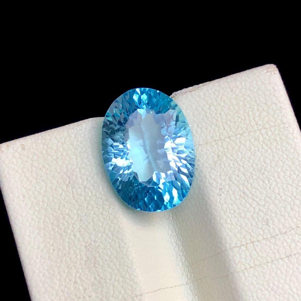 9.90 cts Natural Swiss Blue Topaz Gemstone ? Vibrant Sky Blue Sparkle - 16X11X7 mm: 9.90 cts Natural Swiss Blue Topaz Gemstone ? Vibrant Sky Blue Sparkle - 16X11X7 mmShipping Rate: 23$ WorldWideshipping rates are determined by Parcel weight and destination.Combined shipping: We offer
