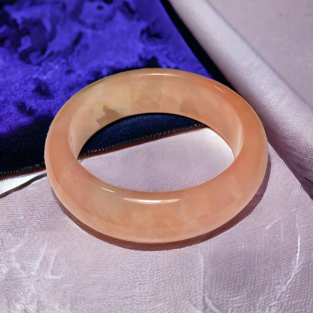 Pink Calcite Top Quality Bangle: Pink Calcite Top Quality Bangle Shipping: Domestic: Flat-rate of 23$ to anywhere within the contiguous U.S.International: Foreign shipping rates are determined by destination. International shipping