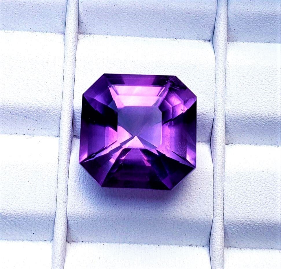 Amethyst Asscher Cut - 13 Carats: Amethyst Asscher Cut - 13 Carats - 15X14X11 mmShipping Rate: $15.00 .shipping rates are determined by Parcel weight and destination.Combined shipping: We offer combine shipping on multiple items purch