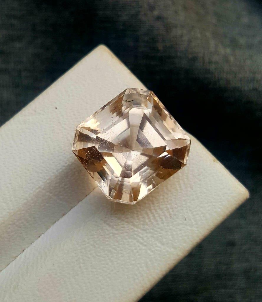 Faceted Natural Golden Topaz - 25.55 Carats: Faceted Natural Golden Topaz - 25.55 Carats - 16X15X12.5 mmShipping Rate: $15.00 .shipping rates are determined by Parcel weight and destination.Combined shipping: We offer combine shipping on multipl