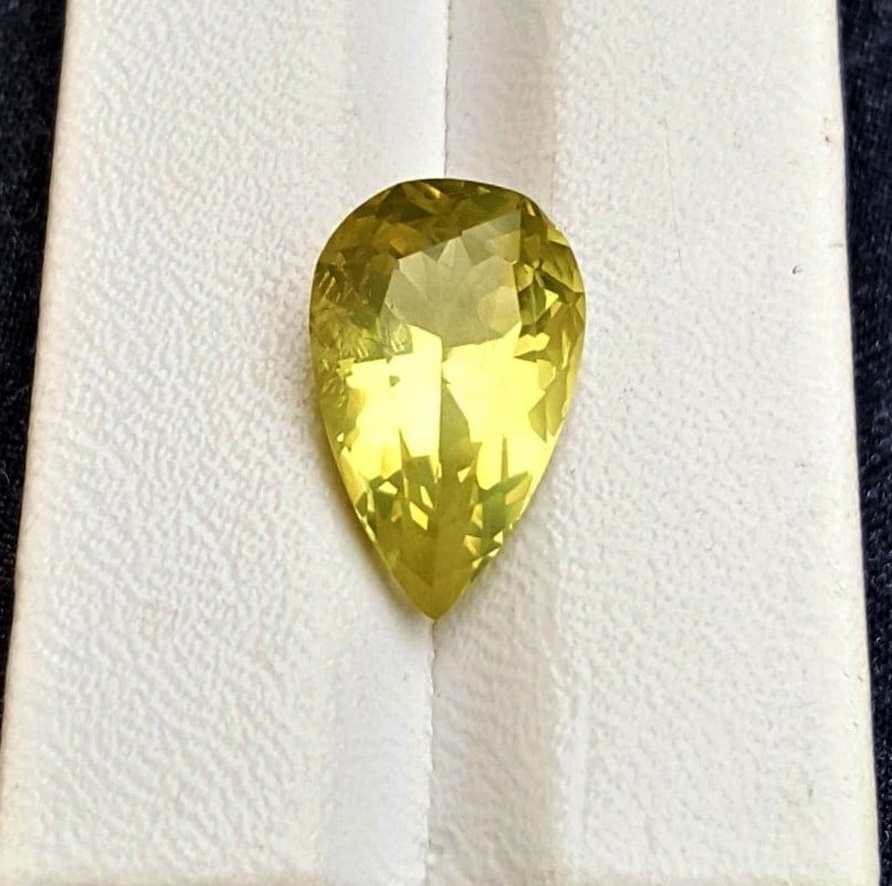 Pear Shaped Lemon Quartz - 10.75 Carats: Pear Shaped Lemon Quartz - 10.75 Carats - 20X12X10 mmShipping Rate: $15.00 .shipping rates are determined by Parcel weight and destination.Combined shipping: We offer combine shipping on multiple