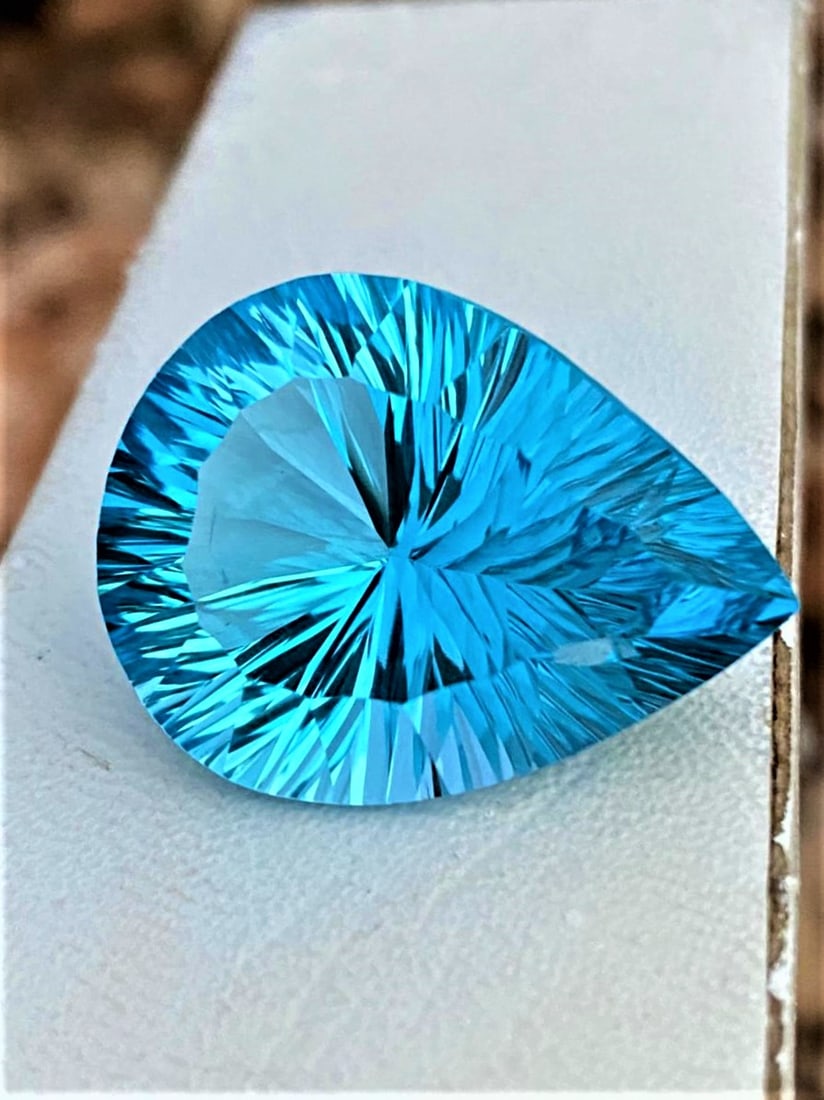AAA Quality Pear Shape Swiss Blue Topaz - 37.20 Carats: AAA Quality Pear Shape Swiss Blue Topaz - 37.20 Carats - 26X17X13 mmShipping Rate: $15.00 .shipping rates are determined by Parcel weight and destination.Combined shipping: We offer combine shipping