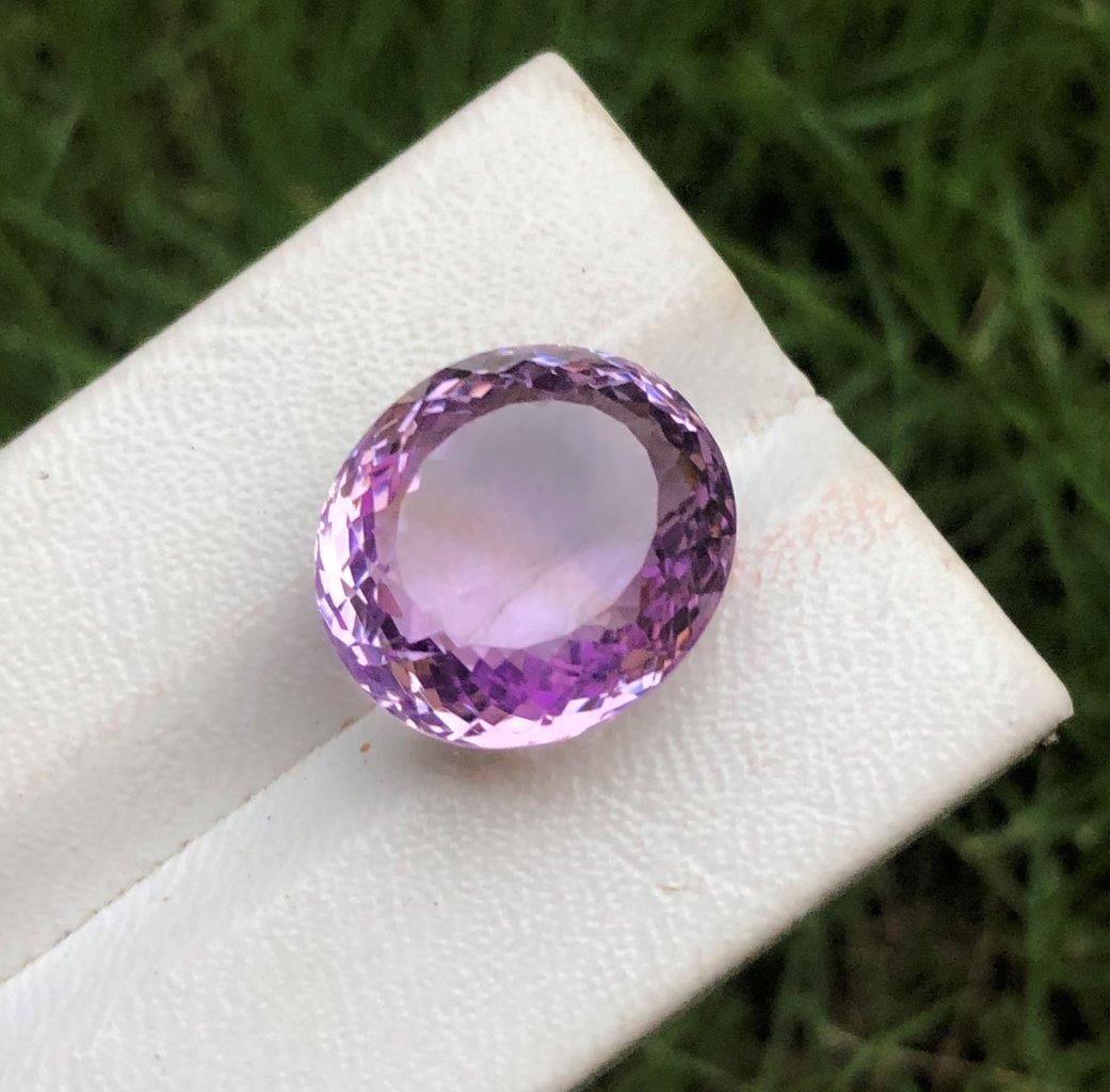 Oval Cut Ametrine - 24.30 Carats: Oval Cut Ametrine - 24.30 Carats - 19X15X14 mmShipping Rate: $15.00 .shipping rates are determined by Parcel weight and destination.Combined shipping: We offer combine shipping on multiple items purch