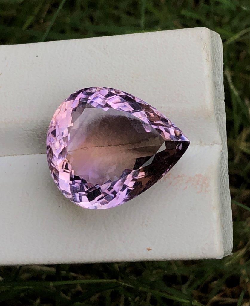 28.30 cts Pear Ametrine: 28.30 cts Pear Ametrine - 23X20X12 mmShipping Rate: $15.00 .shipping rates are determined by Parcel weight and destination.Combined shipping: We offer combine shipping on multiple items purchased to r