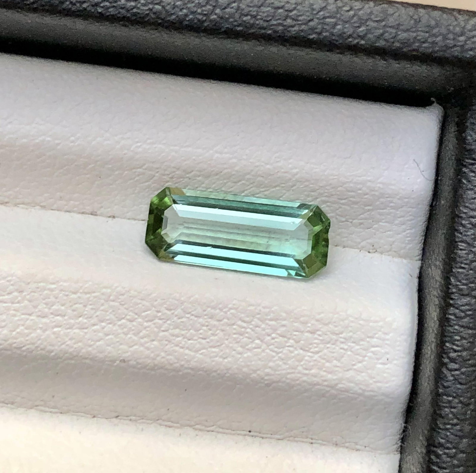 Emerald Cut Natural Bi Colour Ligth Green Tourmaline - 1.60 Carats - 13X5X3 mm: Emerald Cut Natural Bi Colour Ligth Green Tourmaline - 1.60 Carats - 13X5X3 mmShipping Rate: $15.00 .shipping rates are determined by Parcel weight and destination.Combined shipping: We offer combine 