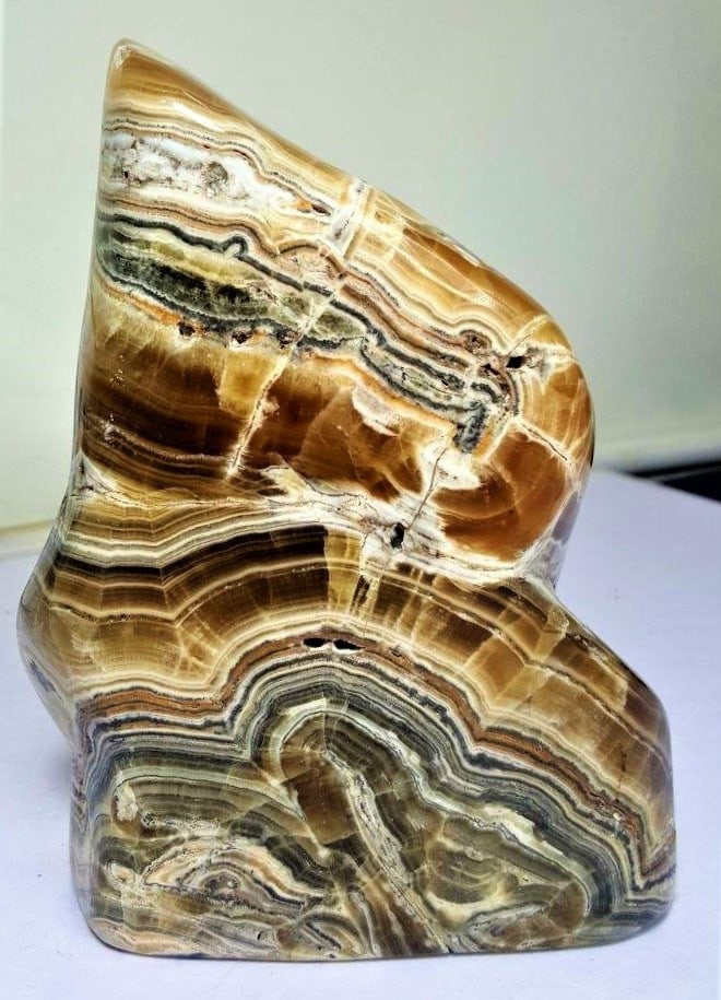 1962 GRAMS CHOCOLATE CALCITE TUMBLE: 1962 GRAMS NATURALLY ITCHED CHOCOLATE CALCITE TUMBLE - 155X139X55 mmShipping Rate: $95.00 .shipping rates are determined by Parcel weight and destination.Combined shipping: We offer combine shipping o
