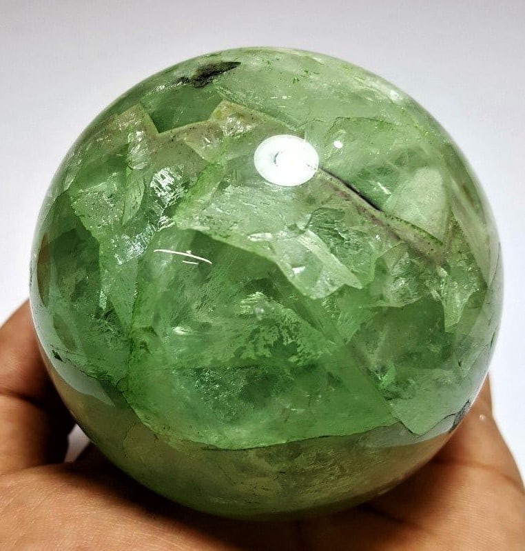 Green Fluorite Large Sphere (715g) Polished: Green Fluorite Large Sphere (715g) Polished - Diameter 74 mmShipping Rate: $60.00 .shipping rates are determined by Parcel weight and destination.Combined shipping: We offer combine shipping on multip