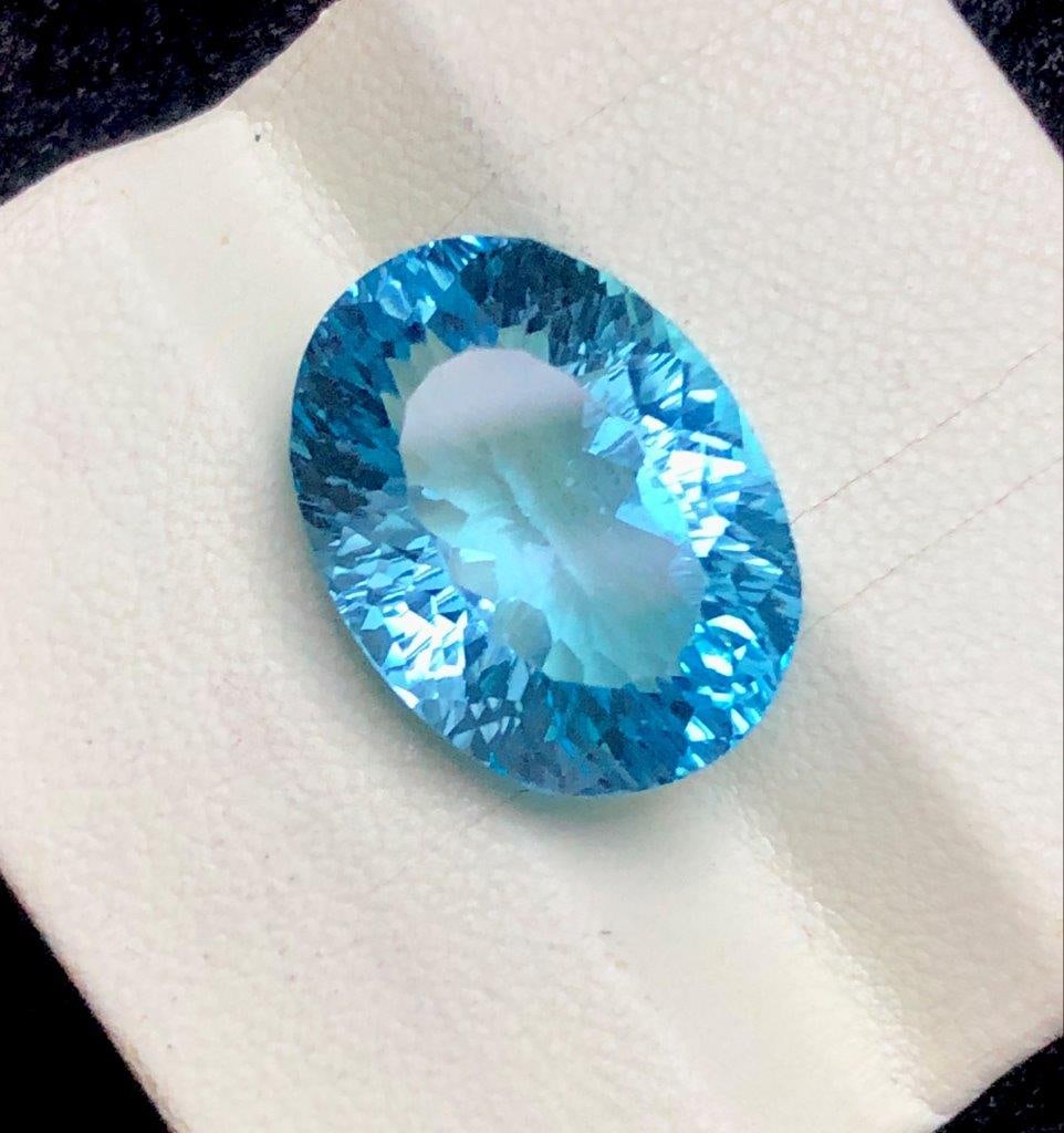 16.65 cts Certified Swiss Blue Topaz Loose Gemstone ? Brilliant Blue - 18X13X9 mm: 16.65 cts Certified Swiss Blue Topaz Loose Gemstone ? Brilliant Blue - 18X13X9 mmShipping Rate: 23$ WorldWideshipping rates are determined by Parcel weight and destination.Combined shipping: We offer 