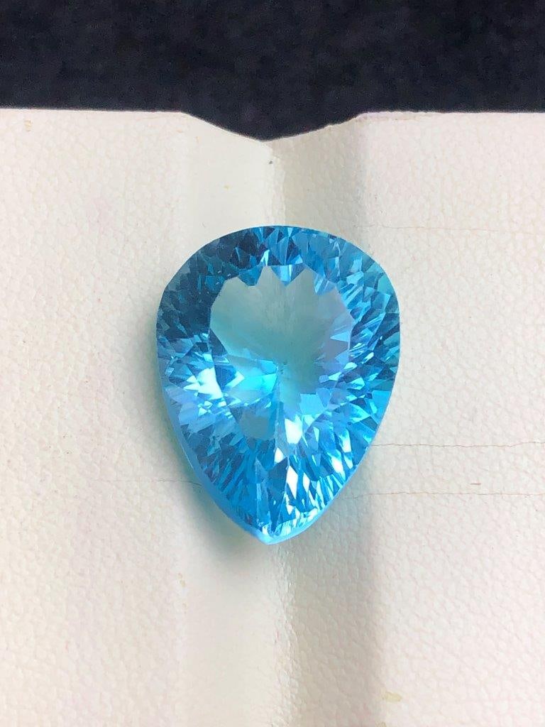 20.05 cts Sparkling Swiss Blue Topaz Loose Gemstone for Custom Designs - 19X15X10 mm: 20.05 cts Sparkling Swiss Blue Topaz Loose Gemstone for Custom Designs - 19X15X10 mmShipping Rate: 23$ WorldWideshipping rates are determined by Parcel weight and destination.Combined shipping: We off