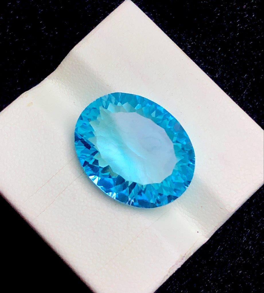 27.10 cts High-Clarity Swiss Blue Topaz Gemstone for Collectors - 21X17X10 mm: 27.10 cts High-Clarity Swiss Blue Topaz Gemstone for Collectors - 21X17X10 mmShipping Rate: 23$ WorldWideshipping rates are determined by Parcel weight and destination.Combined shipping: We offer comb