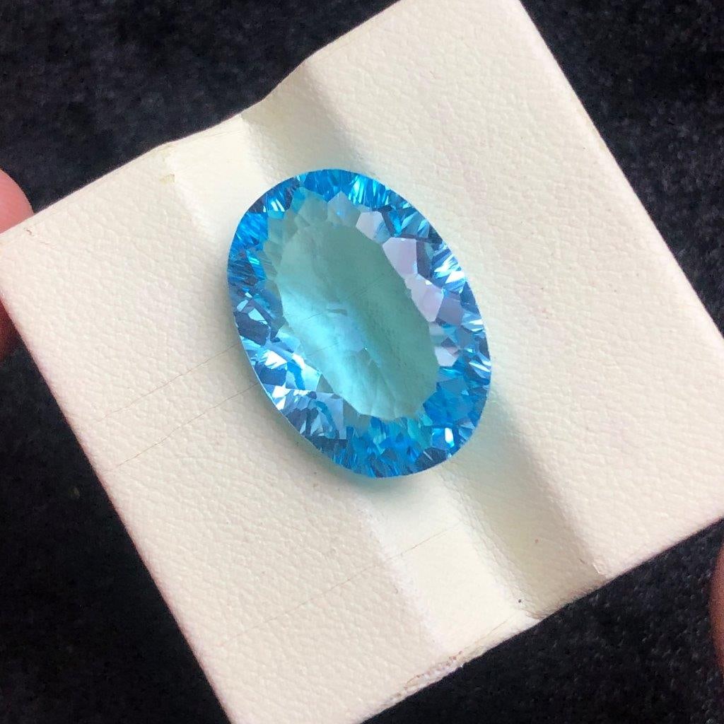 22.20 cts Natural Swiss Blue Topaz Gemstone ? Brilliant Precision Cut - 21.5X15X8 mm: 22.20 cts Natural Swiss Blue Topaz Gemstone ? Brilliant Precision Cut - 21.5X15X8 mmShipping Rate: 23$ WorldWideshipping rates are determined by Parcel weight and destination.Combined shipping: We off
