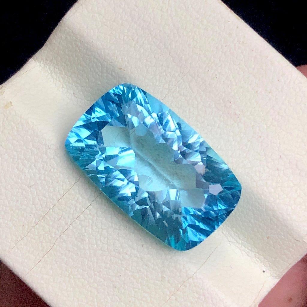 20.75 cts Genuine Swiss Blue Topaz Loose Stone ? Collector's Choice - 20.5X13X9 mm: 20.75 cts Genuine Swiss Blue Topaz Loose Stone ? Collector's Choice - 20.5X13X9 mmShipping Rate: 23$ WorldWideshipping rates are determined by Parcel weight and destination.Combined shipping: We offer