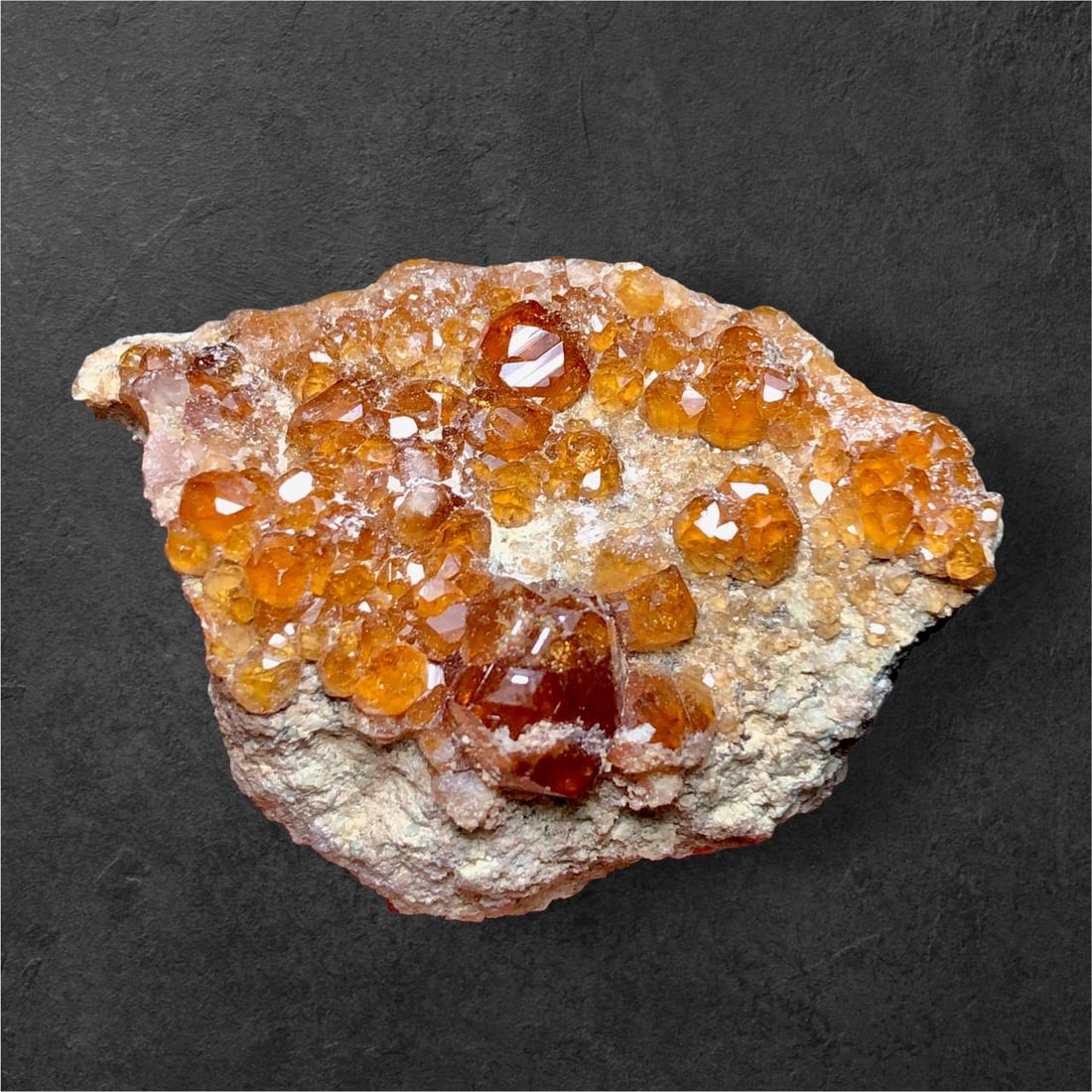 25.6 Grams Natural Hessonite Garnet Cluster on Matrix - 45X31X17 mm: 25.6 Grams Natural Hessonite Garnet Cluster on Matrix - 45X31X17 mm Shipping Rate: $23.00 .shipping rates are determined by Parcel weight and destination.Combined shipping: We offer combine shipping o