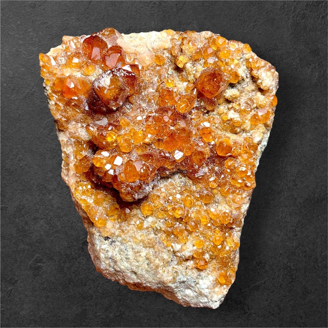 81.9 Grams Natural Hessonite Garnet Cluster on Matrix - 55X50X25 mm: 81.9 Grams Natural Hessonite Garnet Cluster on Matrix - 55X50X25 mmShipping Rate: $26.00 .shipping rates are determined by Parcel weight and destination.Combined shipping: We offer combine shipping